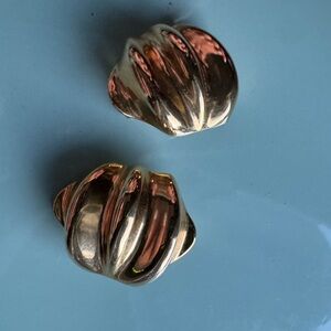 Large gold tone clip on vintage earrings